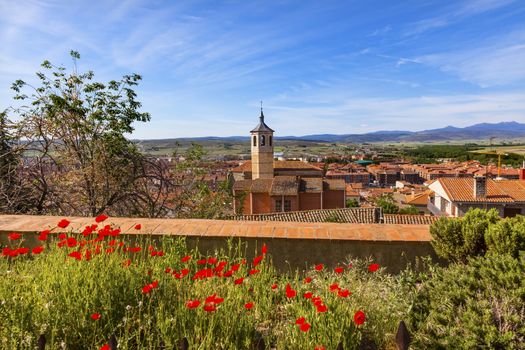 Convent Santa Maria, Convento de Santa Maria de Gracia Red Poppies Swallows Avila Ancient Medieval City Castile Spain.  Convent was founded in the 1500s by Lady Maria Mencia de San Agustin Avila is described as the most 16th century town in Spain. 