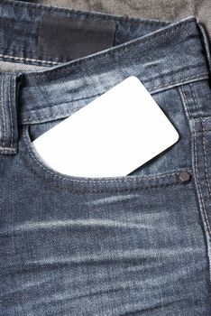 business card in jean pocket pants