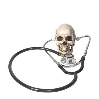 human skull and stethoscope on white background