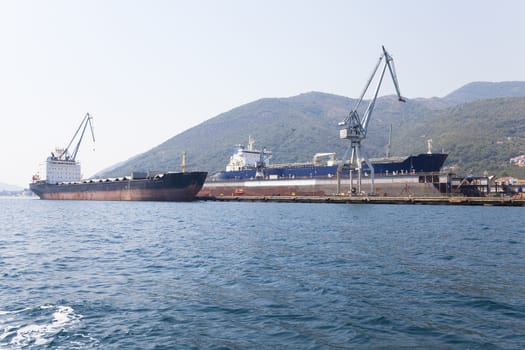   seaport on which mooring there are cargo ships. Montenegro