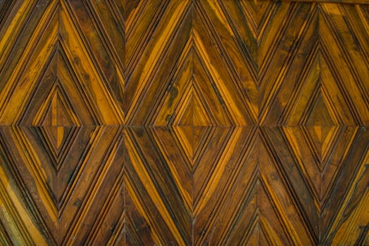 Pattern squares on a wooden wall, Background.
