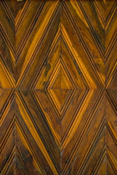 Pattern squares on a wooden wall, Background.