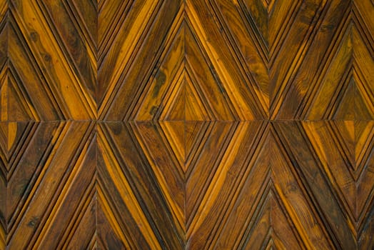 Pattern squares on a wooden wall, Background.