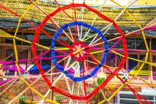 Thread colors to be made into a spider's web.