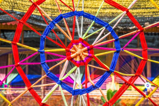 Thread colors to be made into a spider's web.