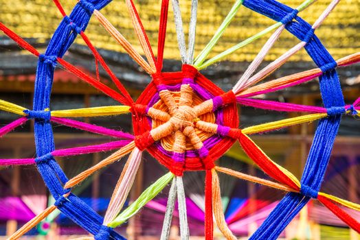 Thread colors to be made into a spider's web.