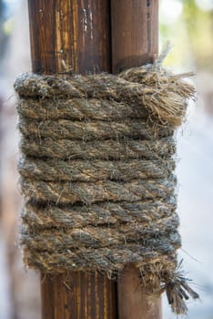 Hemp rope wrapped around the rods to seized the rods to the pole.