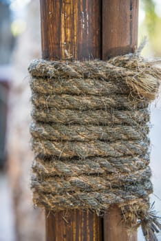 Hemp rope wrapped around the rods to seized the rods to the pole.