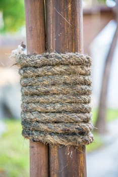 Hemp rope wrapped around the rods to seized the rods to the pole.