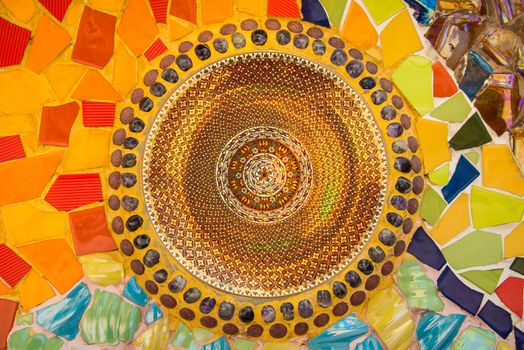 Tile designs many colors and patterns on the walls of the temple. Thailand pattern