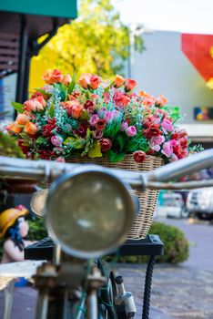 Vintage bicycle with a basket of flowers