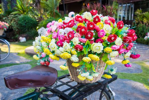 Vintage bicycle with a basket of flowers