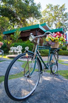 Vintage bicycle with a basket of flowers