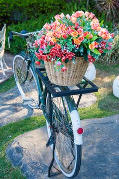 Vintage bicycle with a basket of flowers