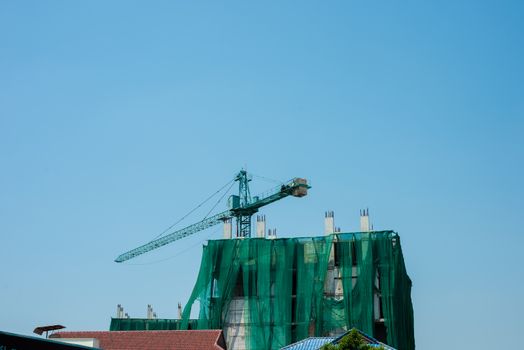 Derrick is used in the construction of tall buildings.