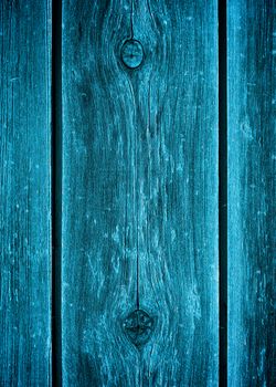 Background of Turquoise Weathered Cracked Wooden Planks with Timber Knots closeup