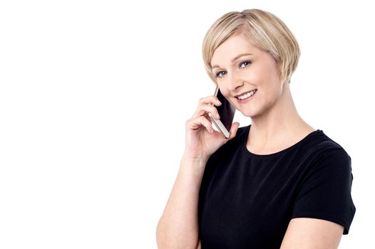 Middle aged woman talking on mobile phone