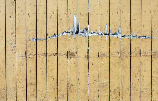 Vintage Yellow Weathered Wooden Plank Door Texture