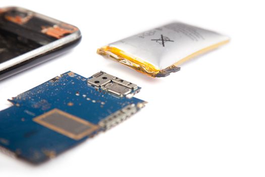 Smartphone unassembled closeup isolated on a white background.