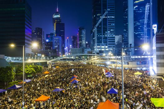 HONG KONG, SEPT 30: Crowd of protesters occupy the road in Admiralty on 30 September 2014. Hong Kong people are fighting for a real universal suffrage for the next chief executive election.