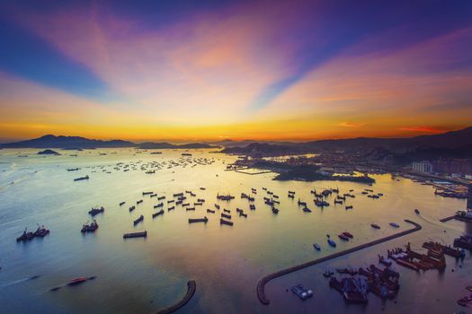 Sunset at container terminal in Hong Kong