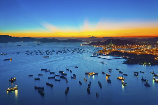 Sunset at container terminal in Hong Kong