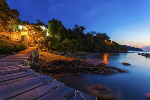 Houses along coast on a wooden bridge