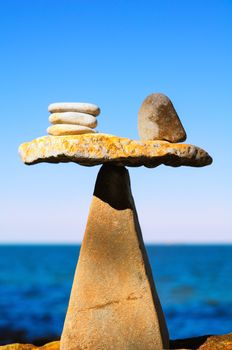 Well-balanced of pebbles on the top of stone