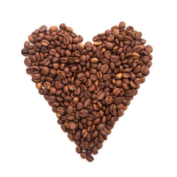 roasted coffee laid out in the form of heart isolated on white background