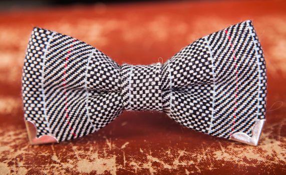 bow tie with a black and white pattern