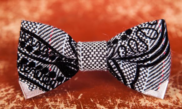 bow tie with a black and white pattern