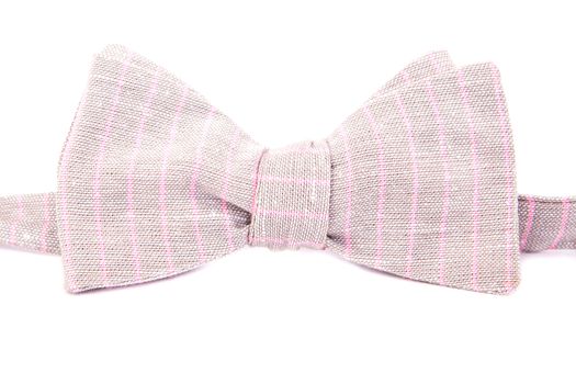 elegant bright striped bow tie made ​​of linen  isolated on white background