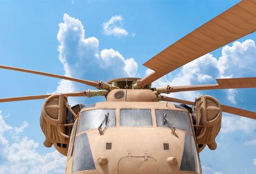 Details of the rotor and part of the body of modern military helicopters closeup