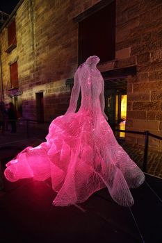 SYDNEY, AUSTRALIA -JUNE 2, 2015;  The Dresses shapes hundreds of fibre-optic strands into the form of three beautiful and extravagant dresses. Suspended in darkness, the dresses appear as apparitions, shimmering from the realms of ethereal fantasy.  Artist Tae Gon Kim