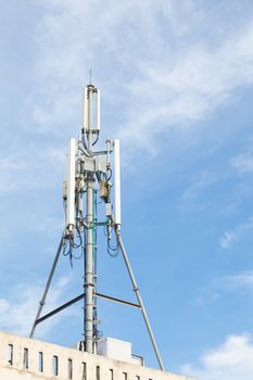 Phone antenna.The transmission poles in the area. Behind the clear skies