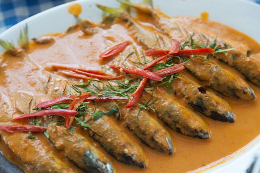 Fish soup with spicy peppers and spices are composed primarily.