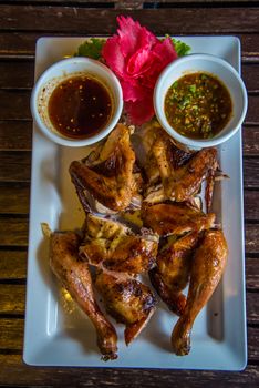 Grilled Chicken on the table in the restaurant.
