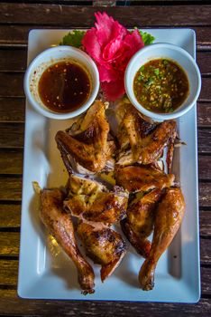 Grilled Chicken on the table in the restaurant.