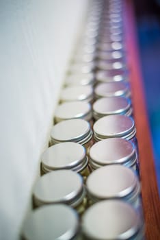 Milk tablets jar on the table, depth