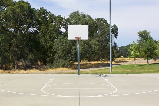 Basketball Hoop and Court With White Backboard with Room for Copy