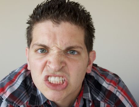 Young Man with Angry Look