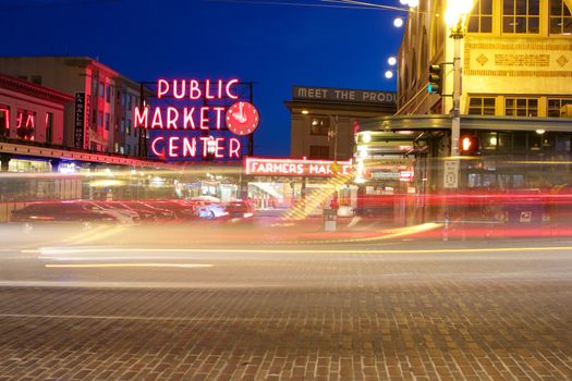 Seattle, WA - July 24, 2015 - Pike Place Public Market Center Sign at Night with Light Trails