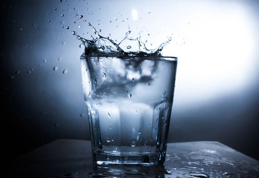 Water Splash in water glass silhouette