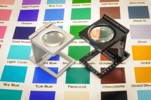 Twin magnifier loupes color management on color chart.