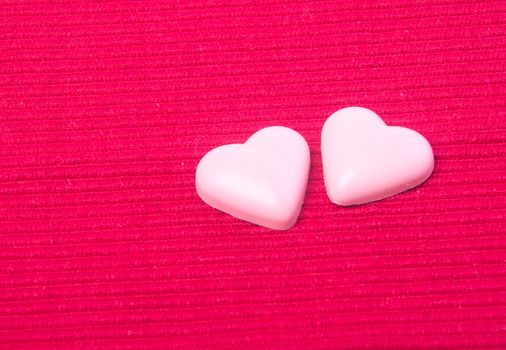 chocolate in pink colour or love shape chocolate