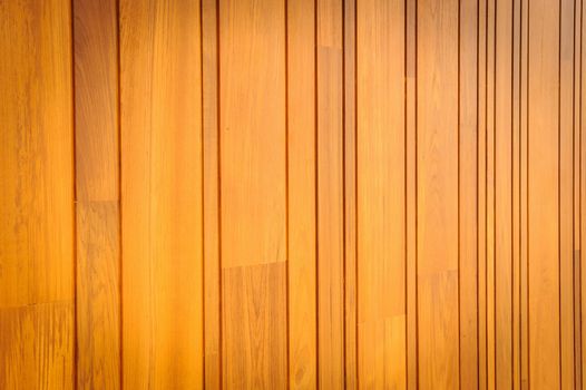 Modern pattern detail of teak wood in background.