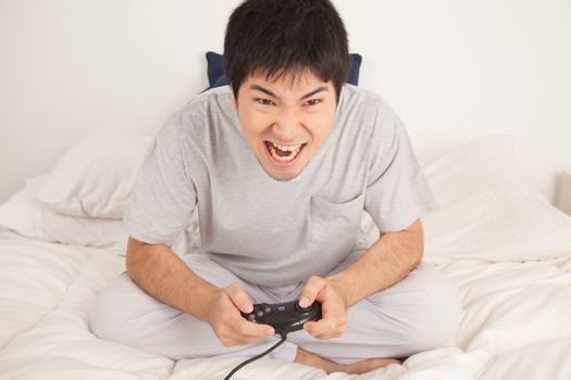 Man playing video games and shouting