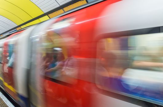 Blurred image of fast moving underground train in London, UK.