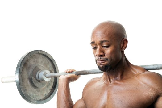 Toned and ripped lean muscle fitness man lifting weights isolated over a white background.