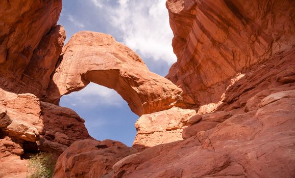 Arches NP provides tall crested buttes with dramatic skies